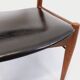 Vintage Scandinavian teak and leatherette chair from the 50s and 60s