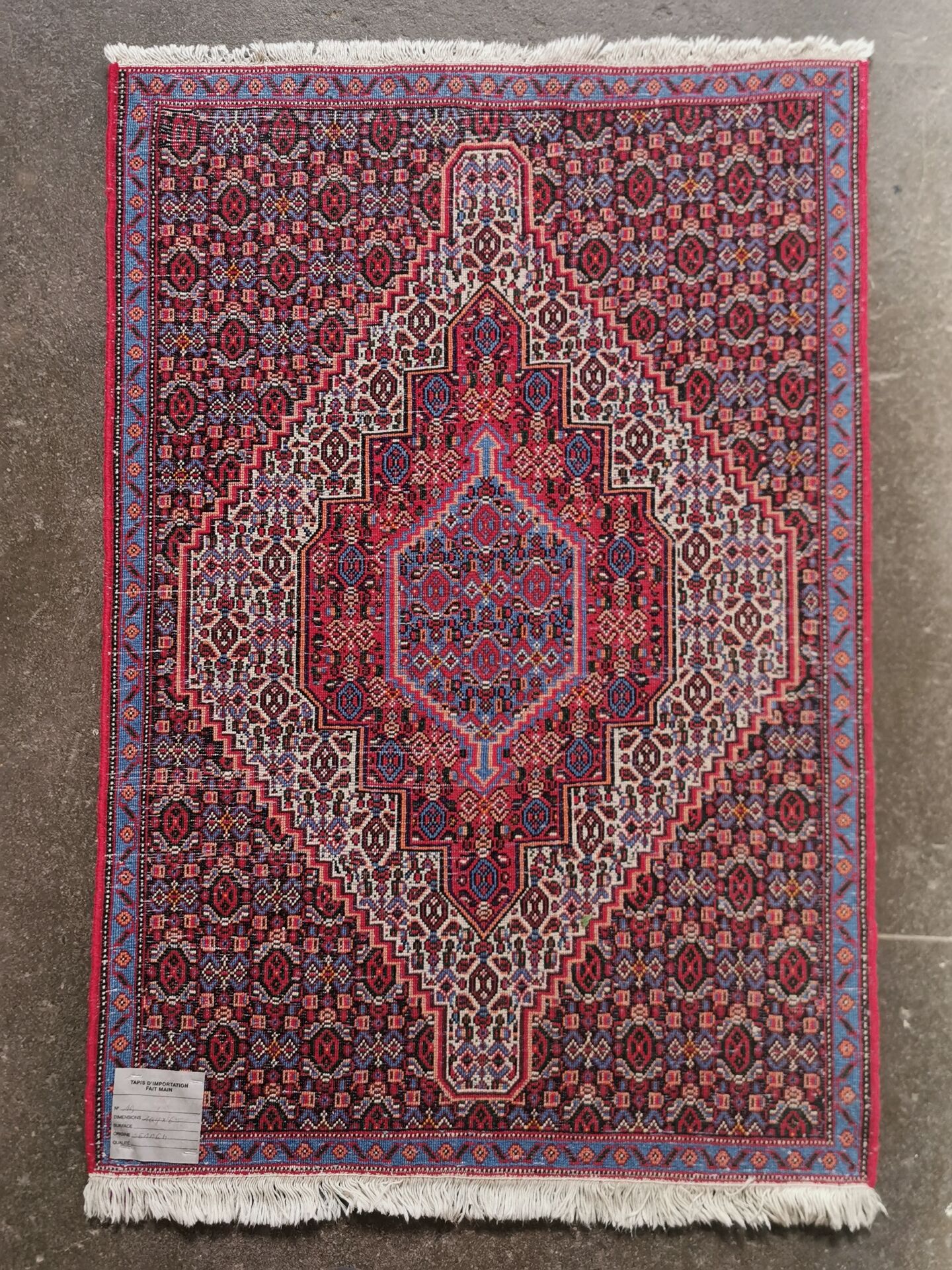 Hand-knotted Senneh Persian rug 109 x 70 cm