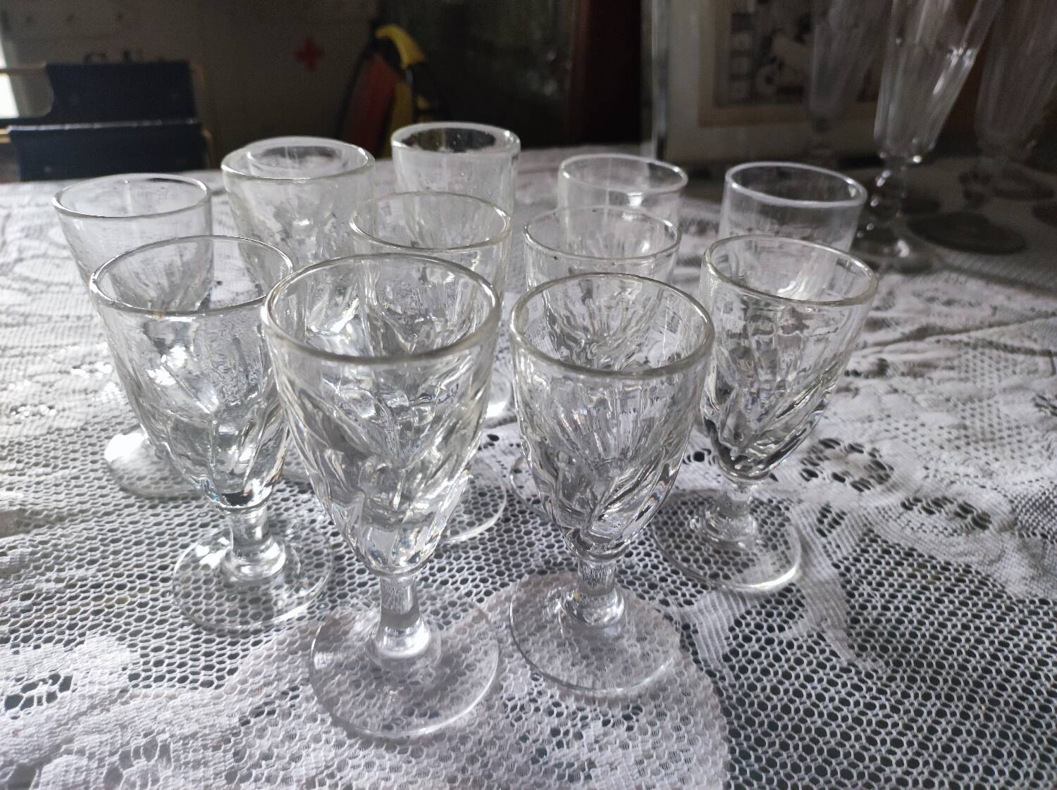 12 small twisted bistro glasses, 19th century
