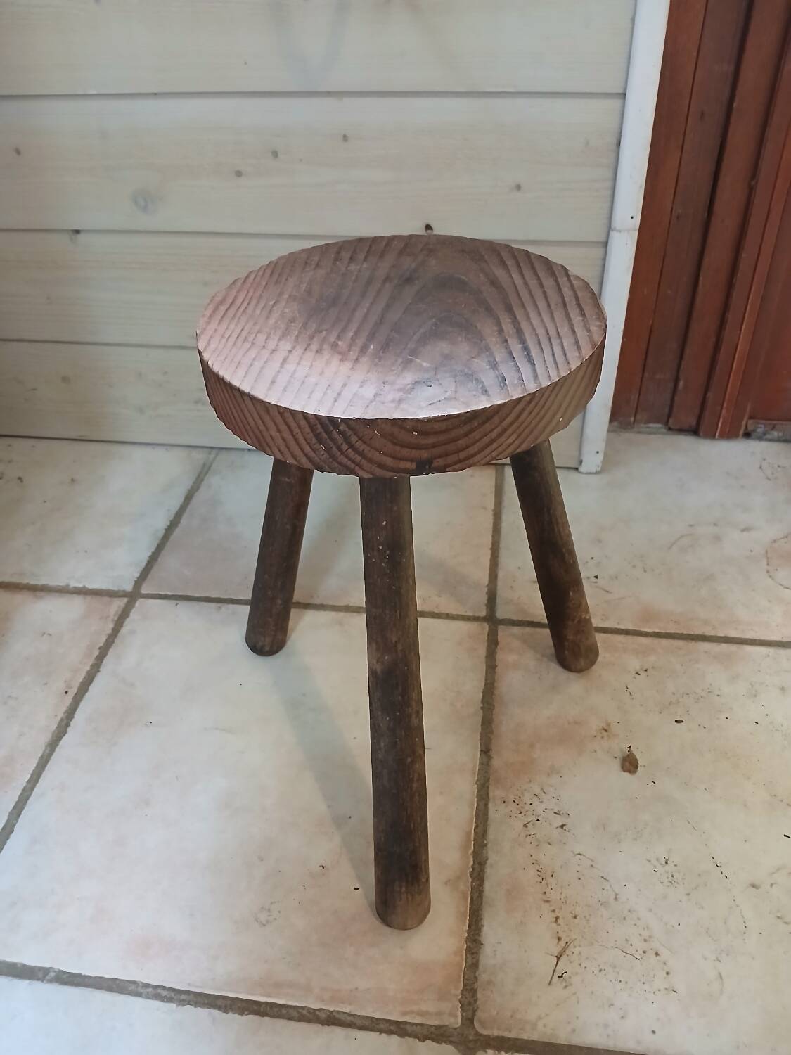 Wooden tripod stool