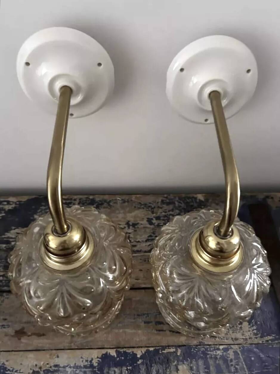 Pair of gold wall sconces