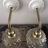 Pair of gold wall sconces