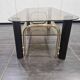 Vintage coffee table in gold metal and smoked glass, 1970s