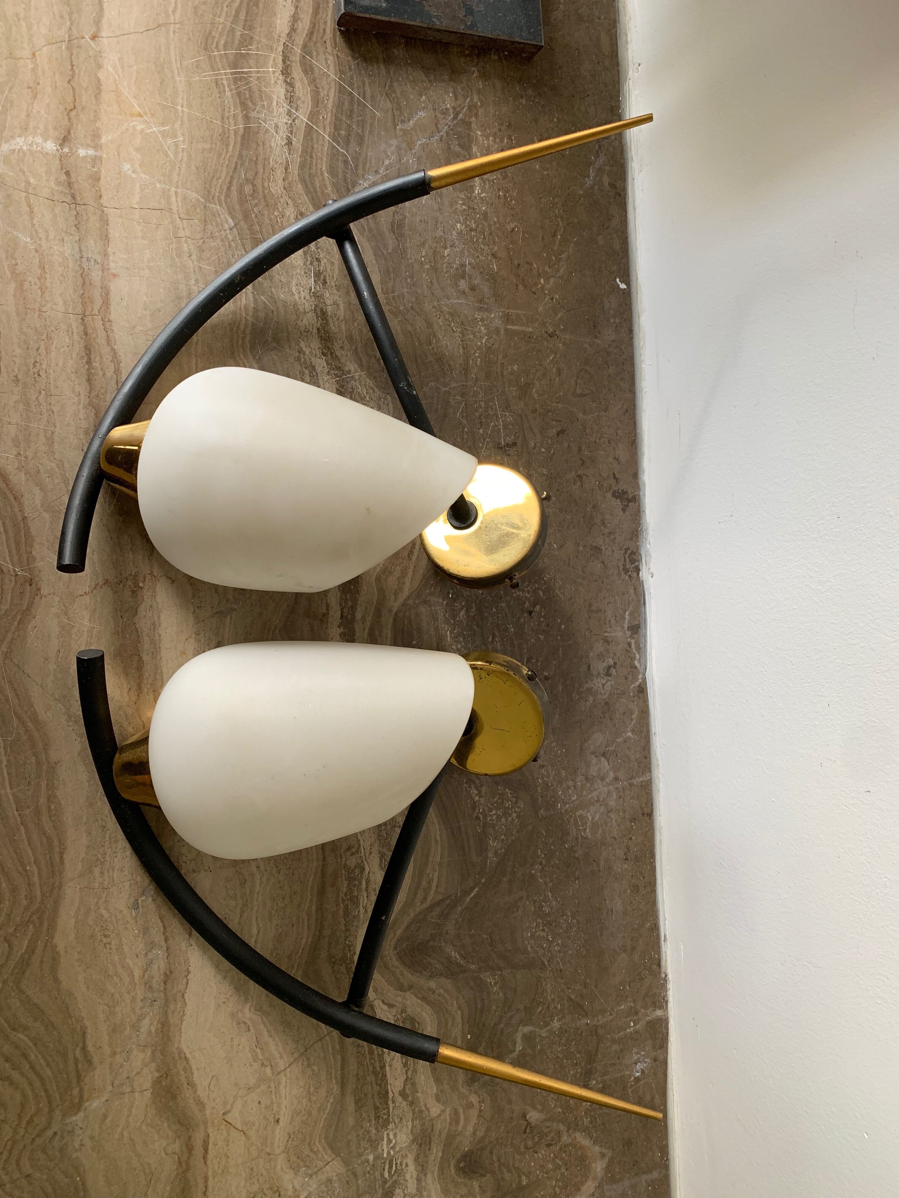 Opaline brass symmetrical and black horn-shaped laqué tube sconces