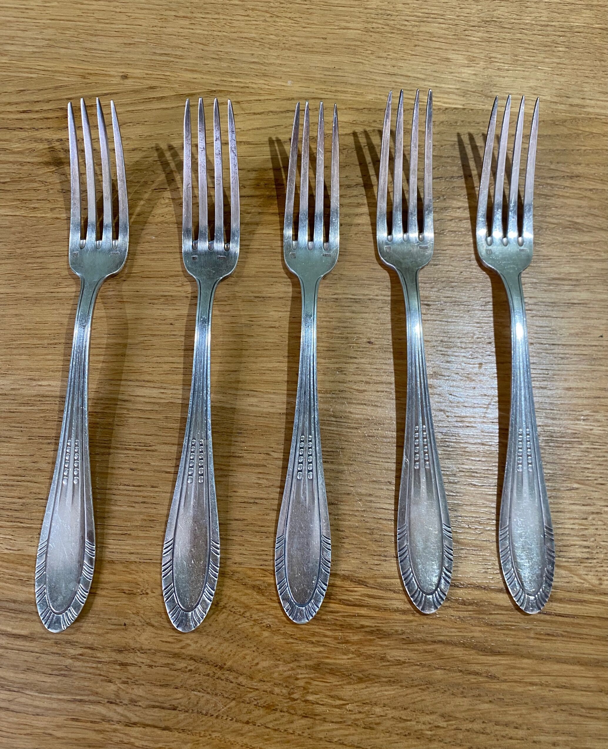 5 antique forks in silver metal