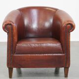 English style sheepskin club chair with a beautiful patina
