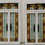 Pair of two-leaf windows in 20th century Art Deco stained glass