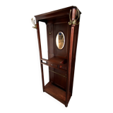 Antique wooden coat rack with mirror and shelf.
