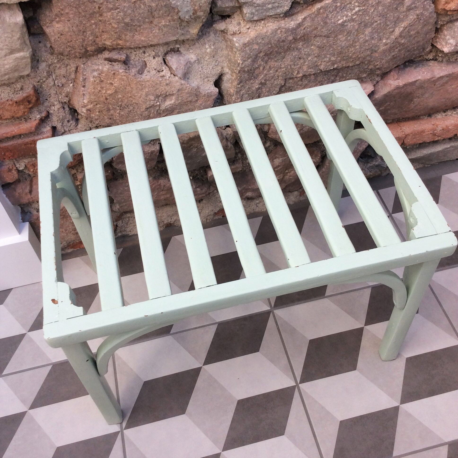 Old wooden suitcase holder