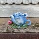Old barbotine candle holder in the shape of a rose