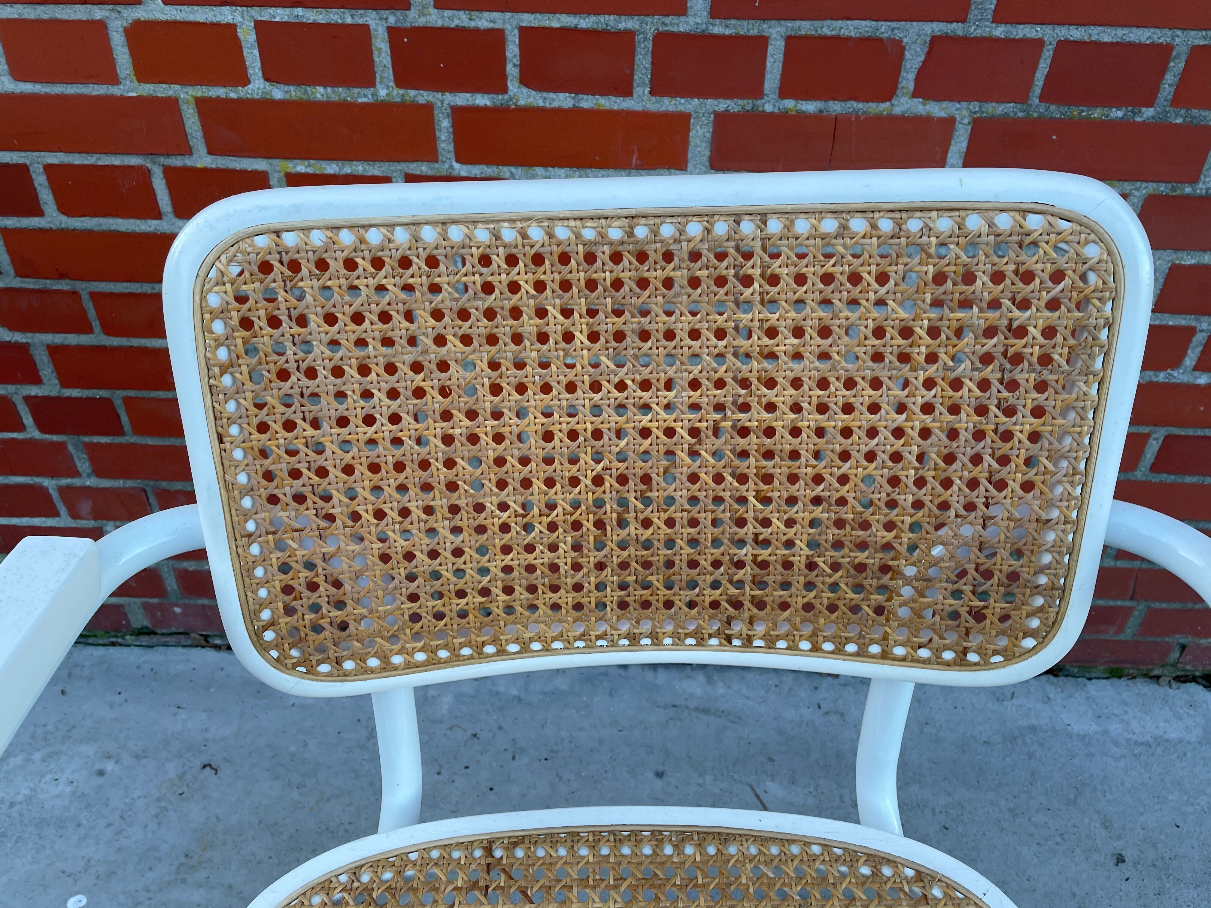 Cesca Chair model with armrest in white