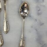 Set of 12 spoons of the middle twentieth in silver metal