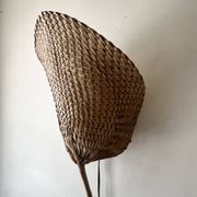 Woven rattan wall light in the style of Igno Maurer, design from the 1970s.