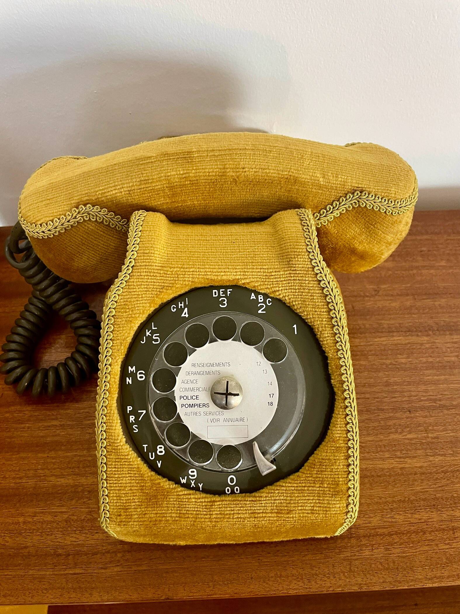 Socotel S63 telephone with its gold velvet shell