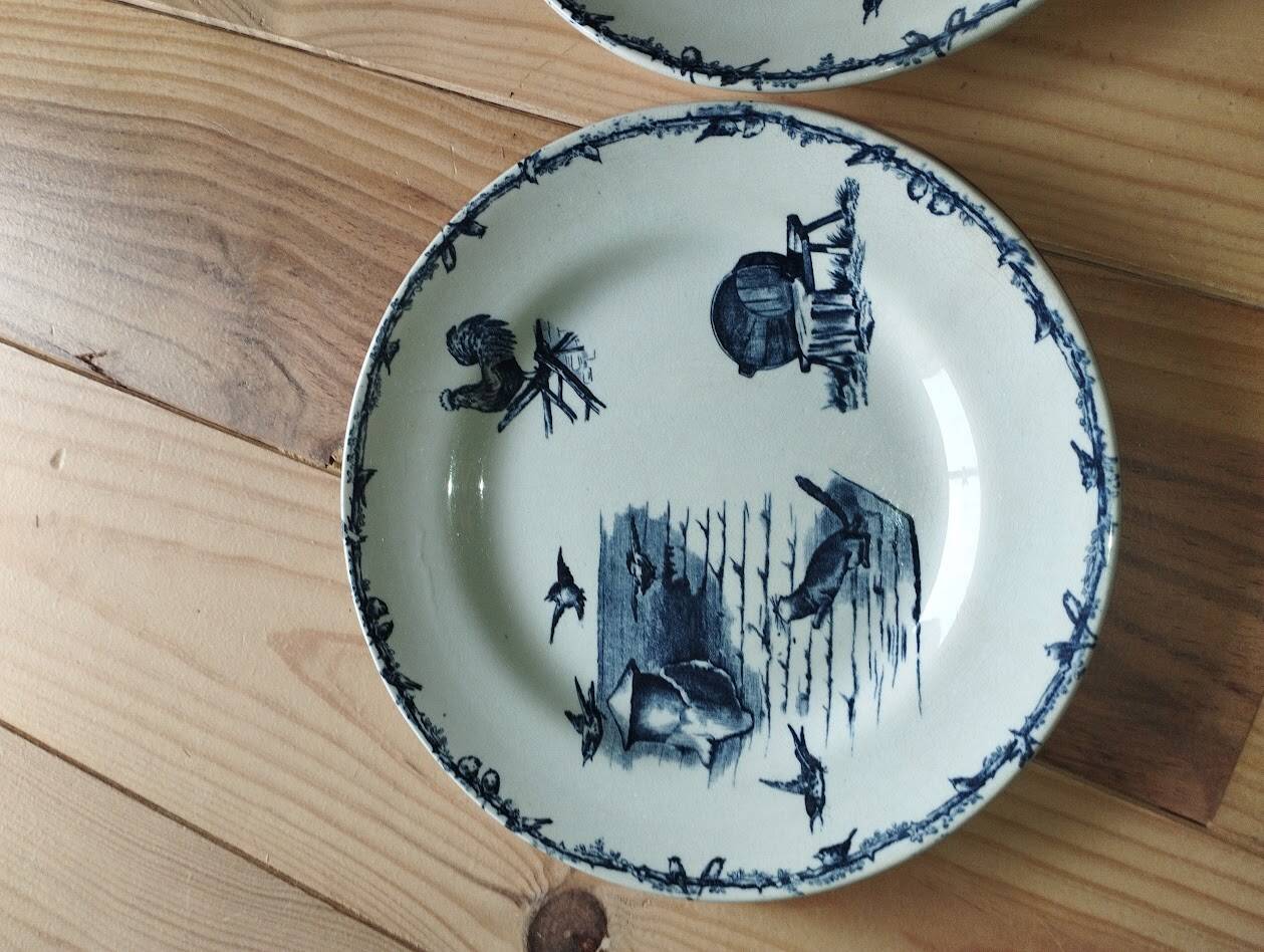Assiettes Terre de Fer – Décor pastoral bleu – XIXe