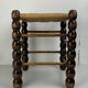 Brutalist wood turned bobbin rush stool in the style of Charles Dudouyt