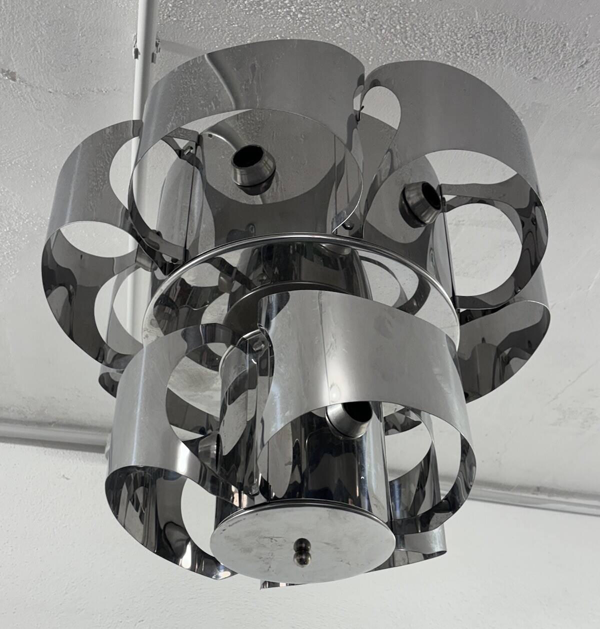 Curved steel chandelier attributed to Max Sauze, 9 lights