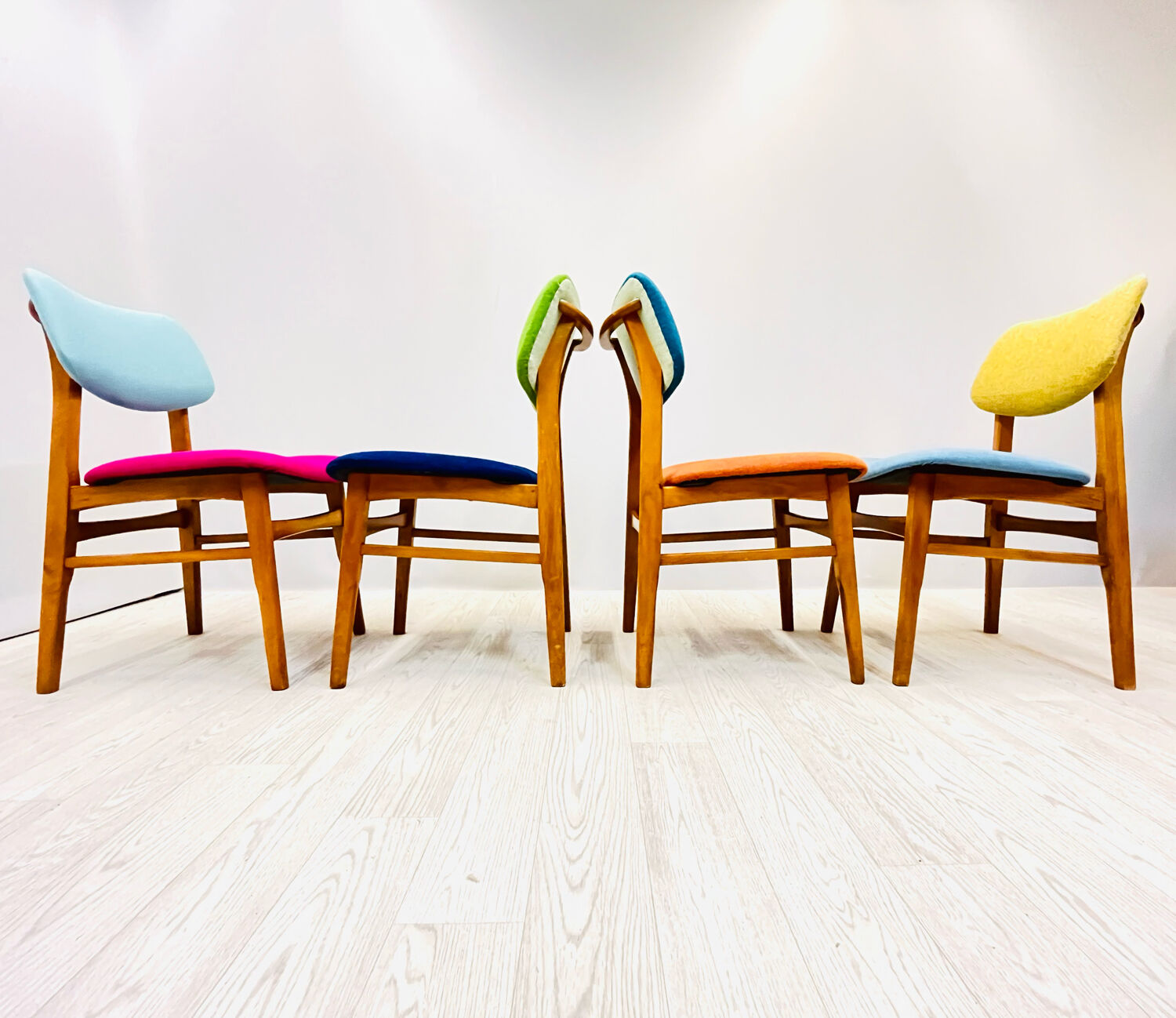 Four middle century chairs