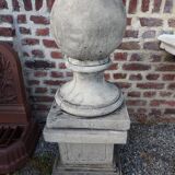 Ball on base in gray patinated reconstituted stone