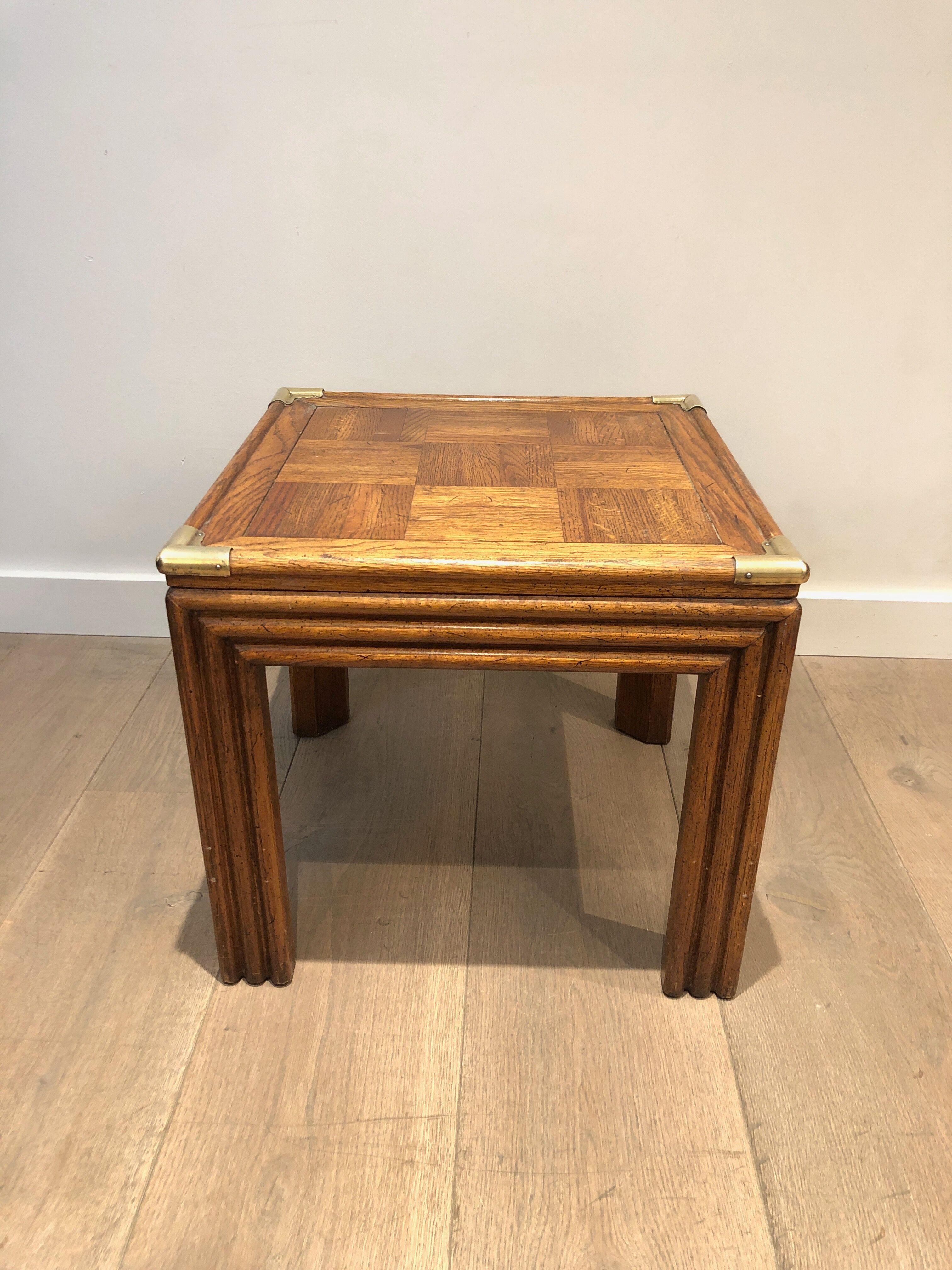 Pair of wooden and brass sofa ends