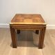 Pair of wooden and brass sofa ends