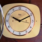Clock formica vintage silent wall pendulum "Yellow Odo"