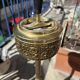 Floor ashtray in gilded brass (frieze of fish)
