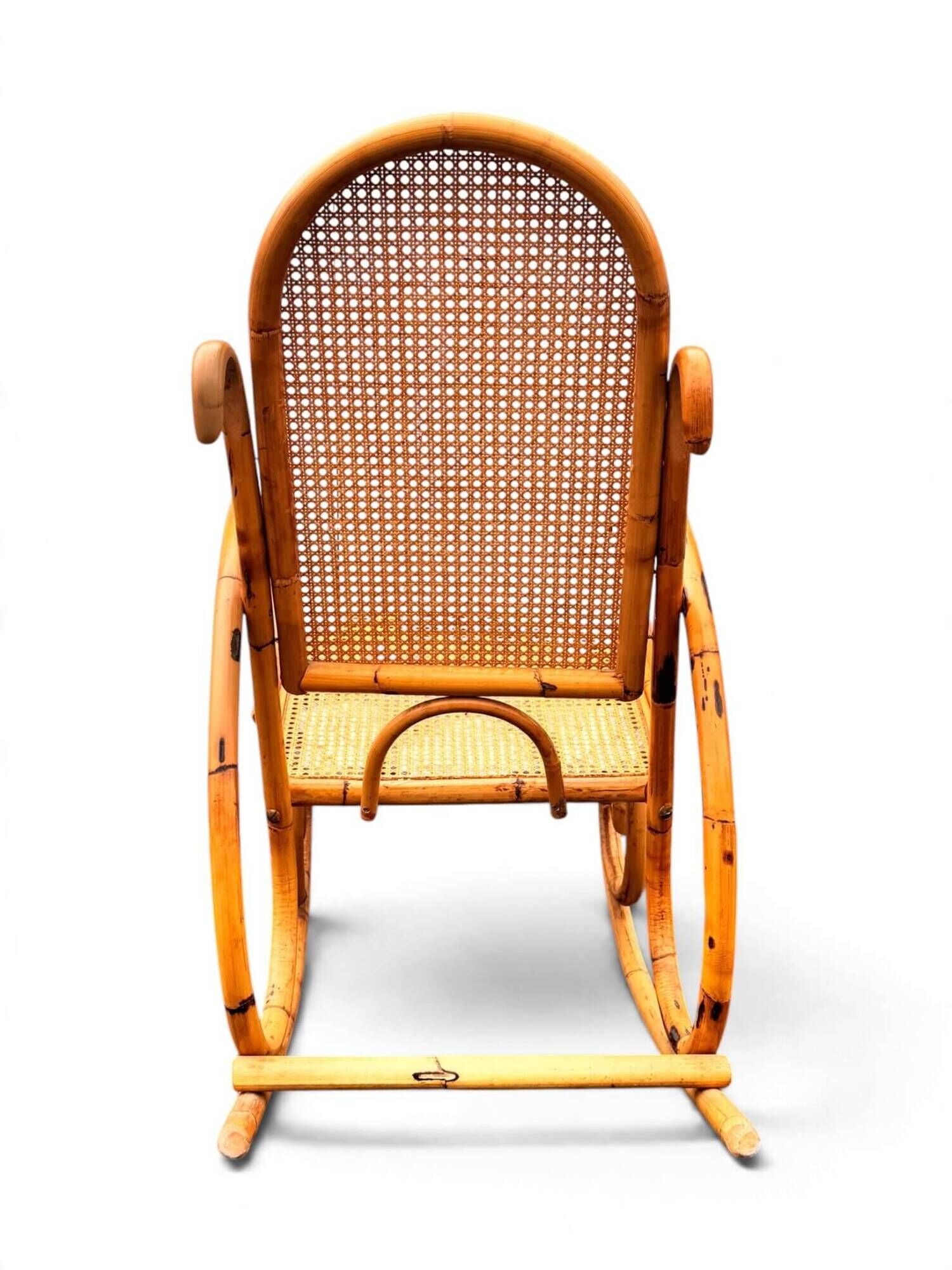 Vintage rocking chair in bamboo and cane
