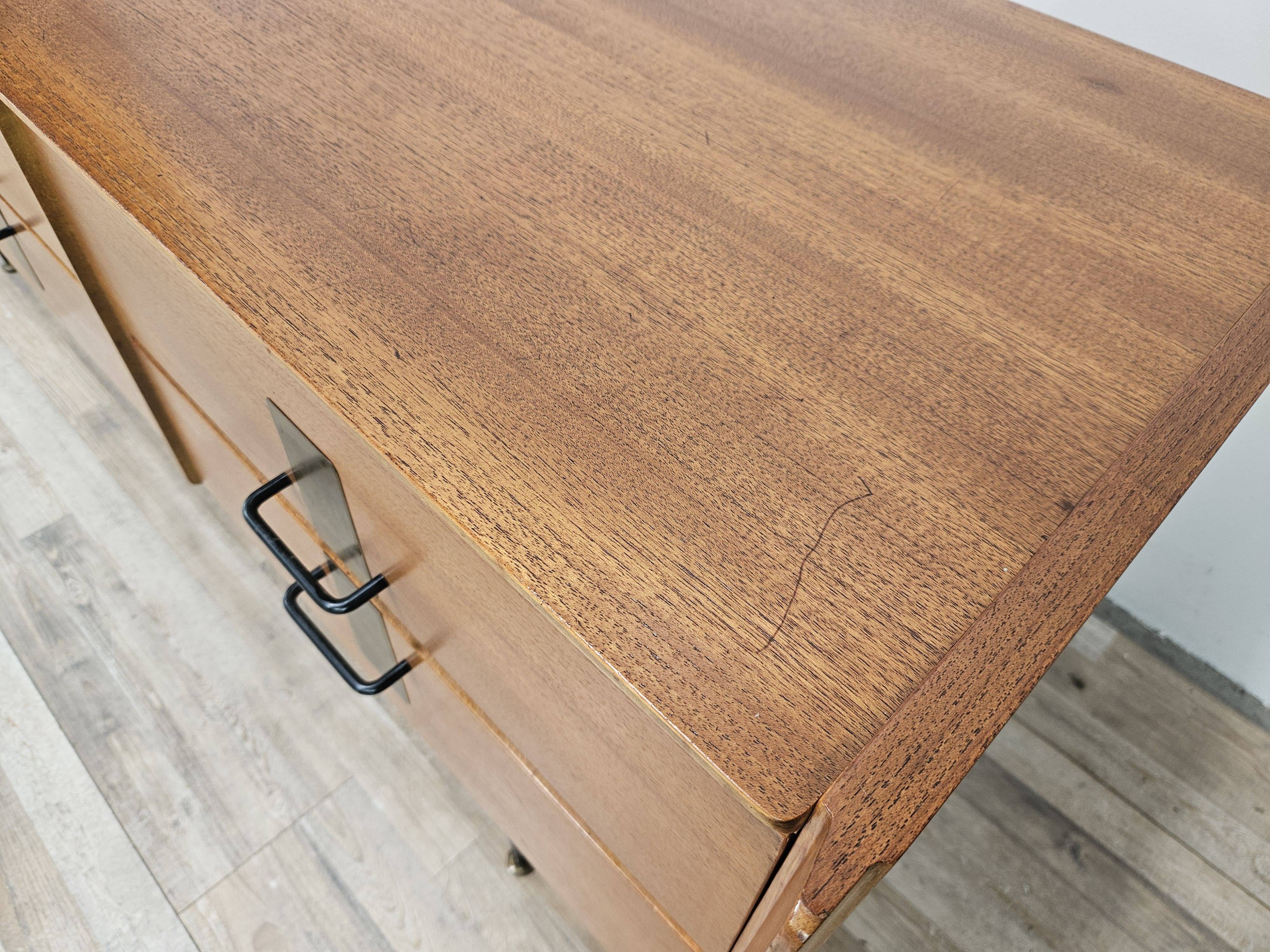 1960s walnut chest of drawers with iron and brass details