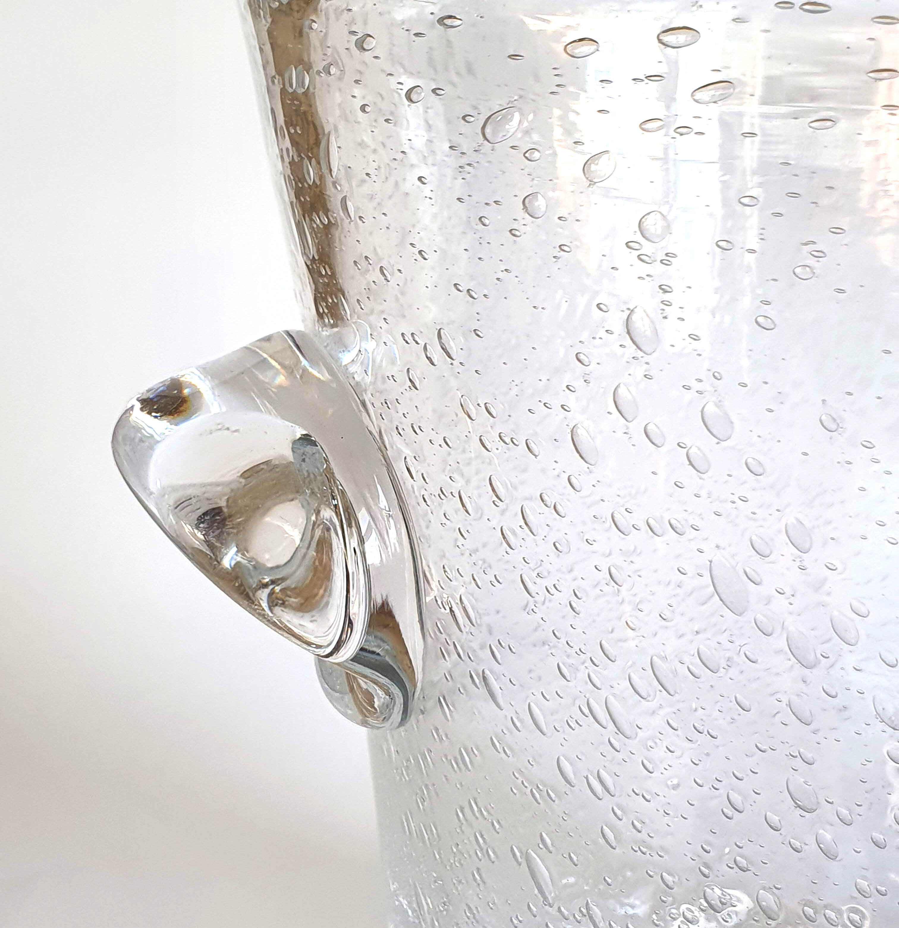 Champagne bucket in glass of biot