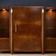 Important Art Deco library in amboyna and mahogany veneer.