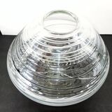 Textured oval blown glass vase with black and white glass spaghetti.