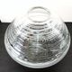 Textured oval blown glass vase with black and white glass spaghetti.