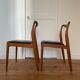 Pair of Scandinavian chairs in teak and skaï, 1965