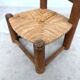 Brutalist chair in wood and straw