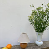 Wooden ball bedside lamp and beige lampshade