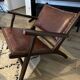 Armchair in wood and leather