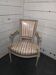 Louis xvi style bergère armchair in patinated wood