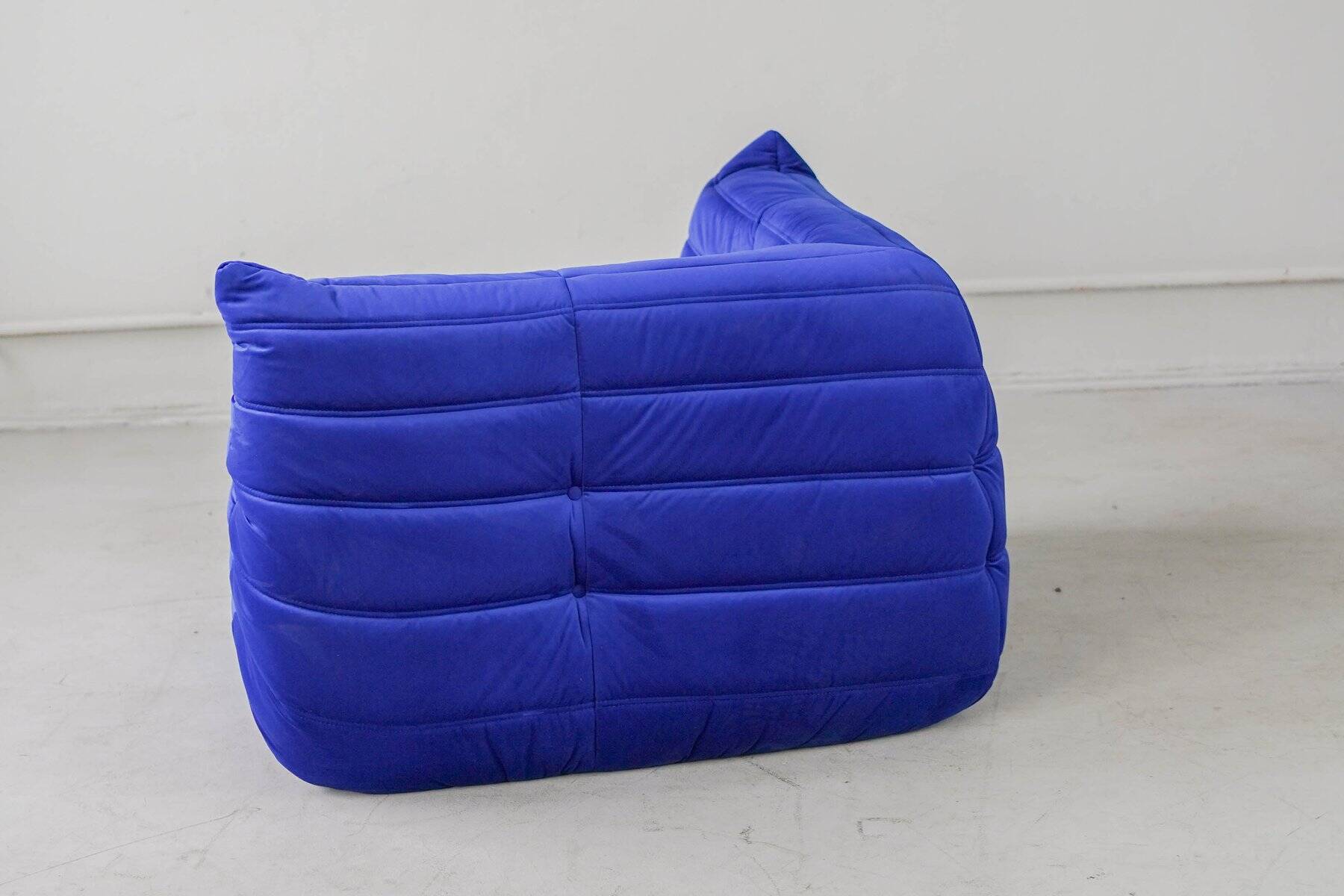 Togo corner chair in blue velvet by Michel Ducaroy for Ligne Roset
