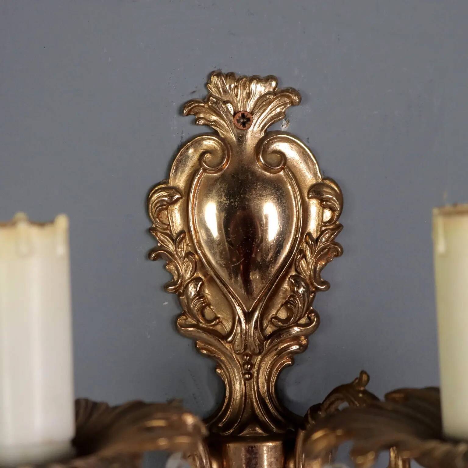 Antique wall sconces in Rococo style, bronze, Italy, 20th century.