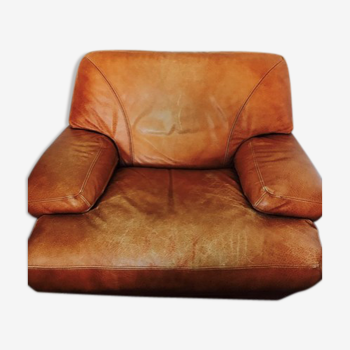 Tawny leather armchair