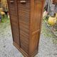 Antique double curtain cabinet in oak (internal drawers)