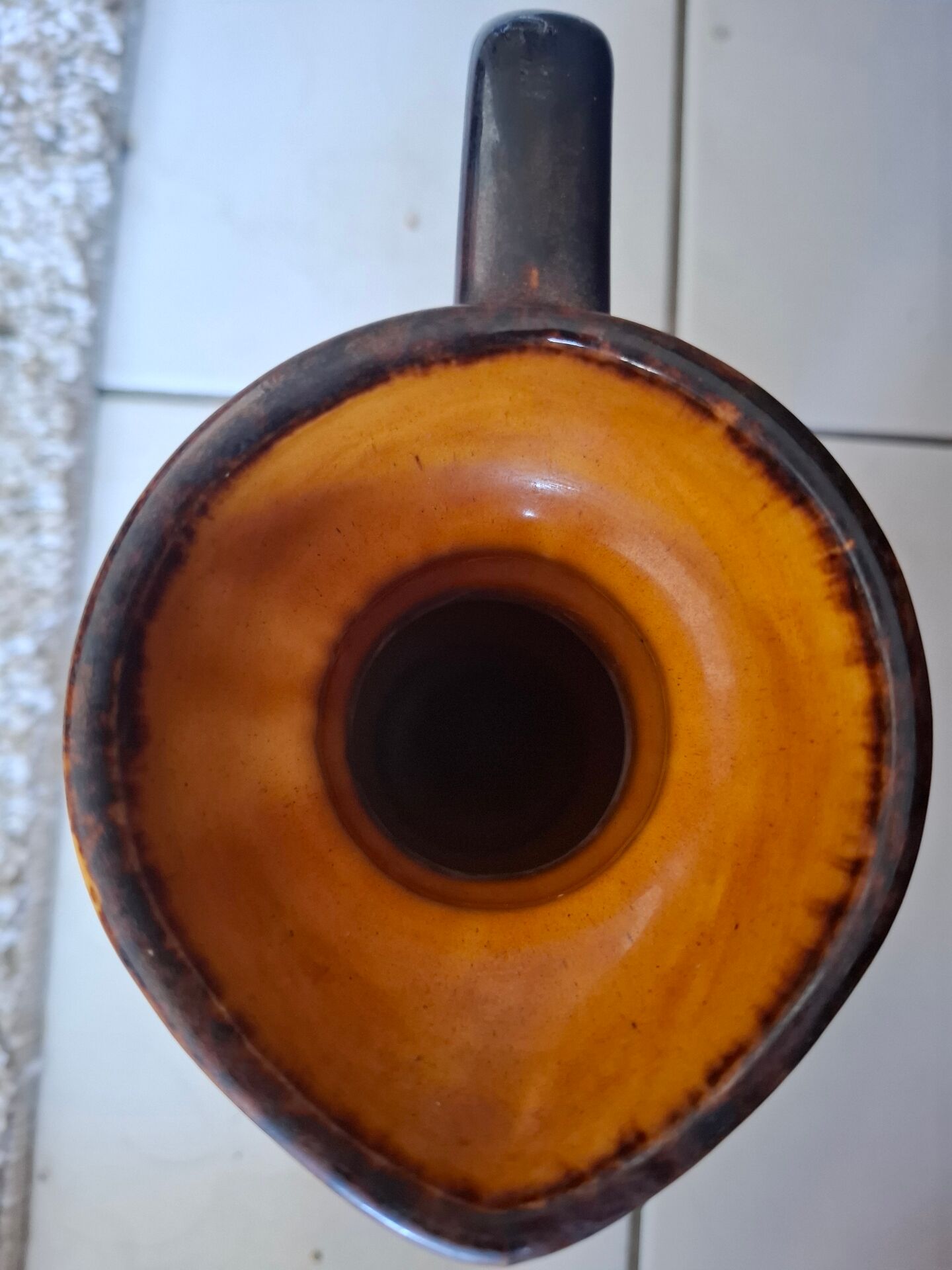Old ceramic pitcher signed Angèle