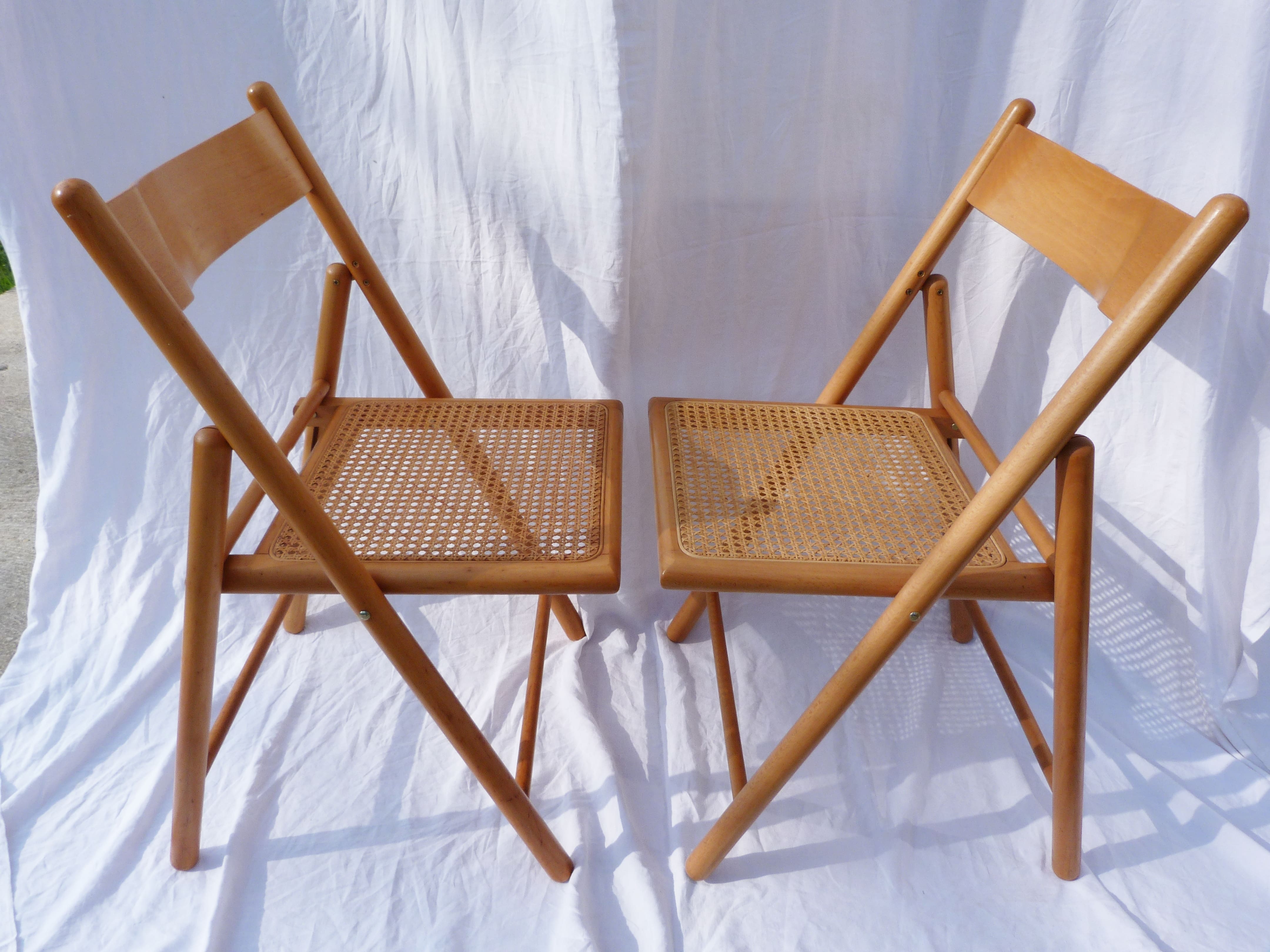 Duo of canned folding chairs