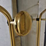Wall-mounted coat racks in black and gold lacquered metal, circa 1950-1960