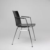 Mid-century modern black design chair in with armrests, Belgium