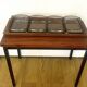 Vintage teak plateau attributed to Digsmed with four ramekins in glass.