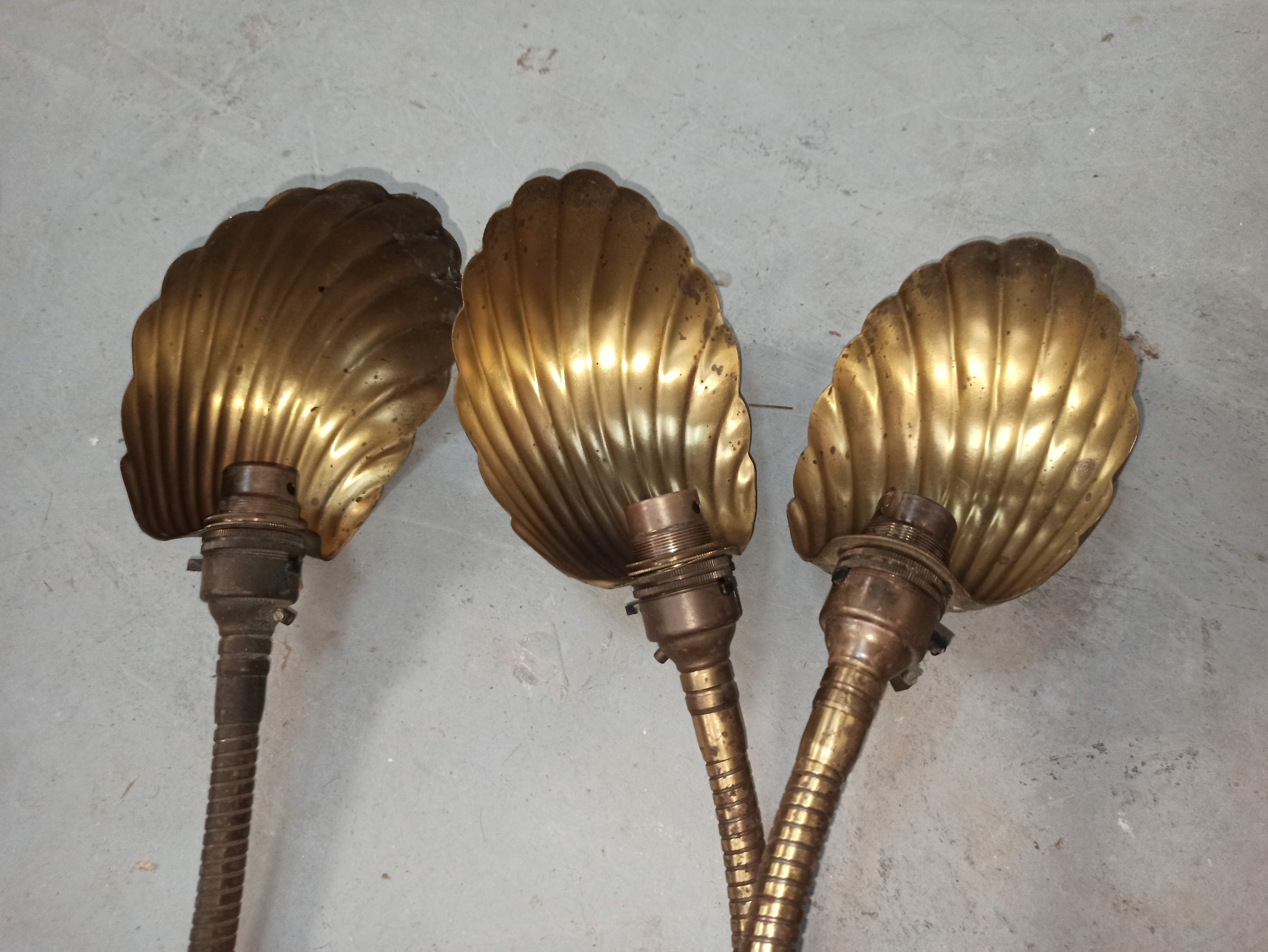 Trio of wall lamps Christopher Wray applies articulated lamp shell