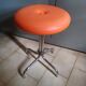 Vintage 70's rotating stool, chrome base, orange imitation leather seat