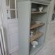 Louis Philippe style bookcase reenchanted in verdigris, 3 light oak waxed shelves.